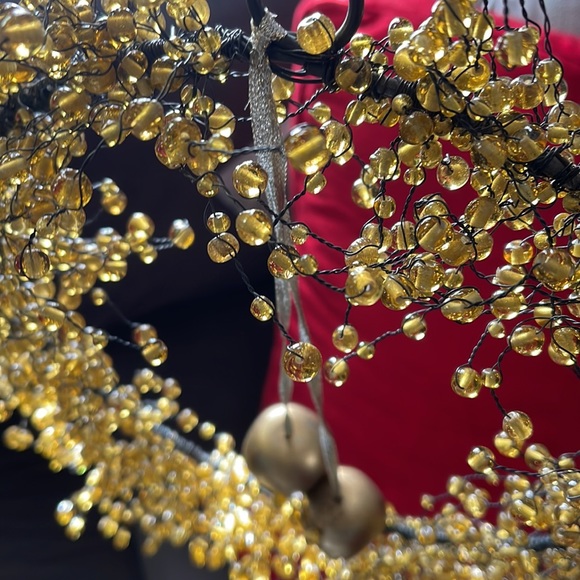 Gold bead wreath on metal frame. Diameter frame 10.5 inches. Beads stretch to 15 - Picture 3 of 12